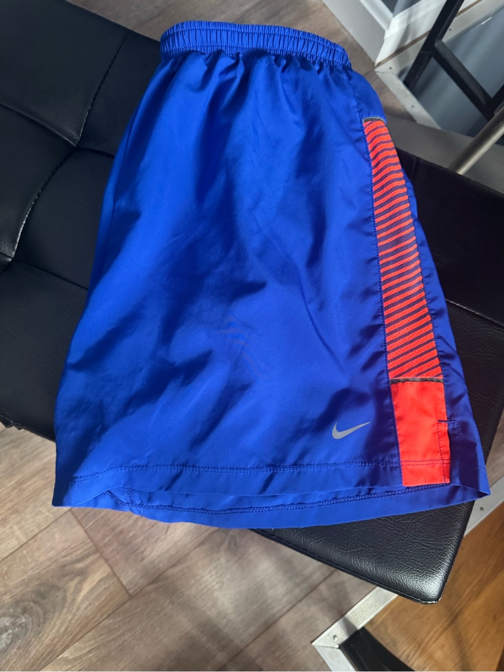 Nike Men’s Drifit Royal Blue Athletic Shorts with Orange Stripe